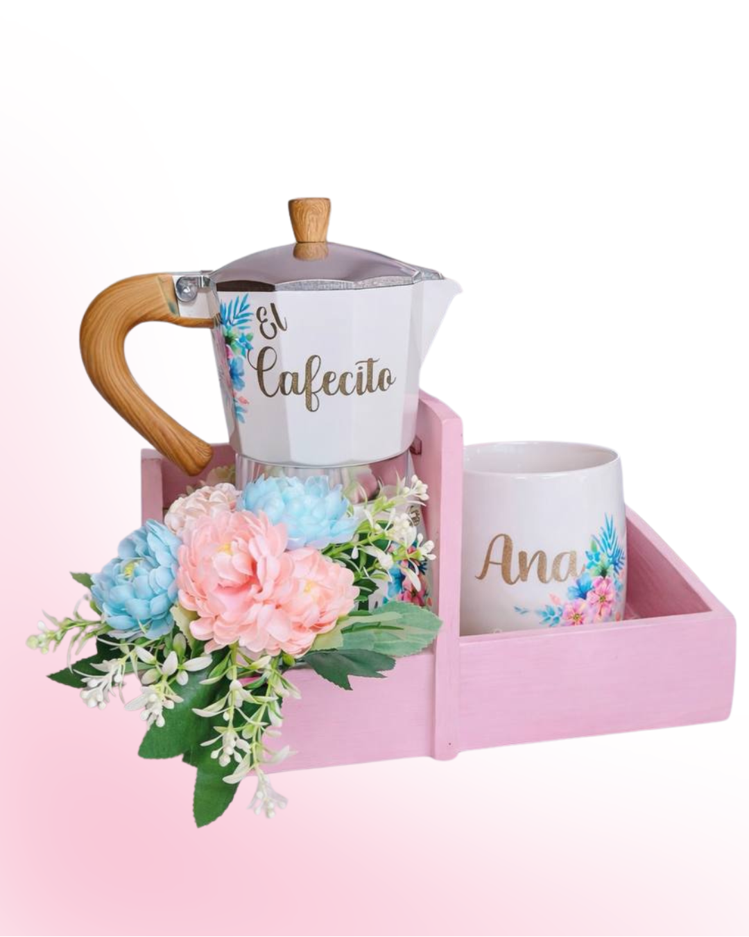 Set de greca con asa de madera, y taza con bandeja. Su diseño floral en tonos suaves, acompañado de una greca personalizada y una taza con nombre, lo convierte en una pieza perfecta para decorar la cocina, regalar a una amante del café o sorprender a alguien especial con un detalle único y memorable.

Contiene la greca con aza de madera de capacidad 7 tazas, 1 taza y una cajita de madera.
